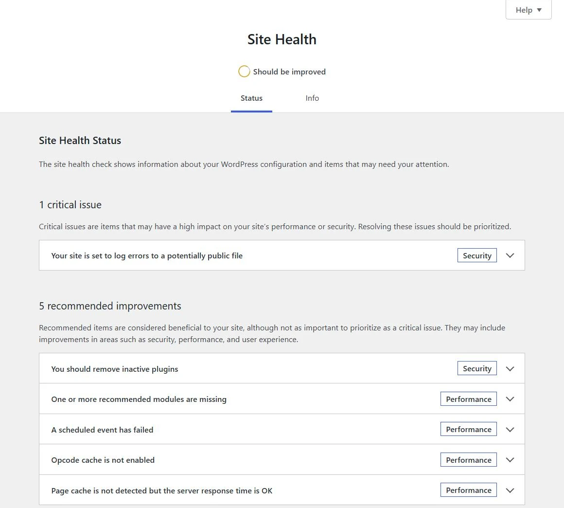 WordPress Site Health Status showing 1 critical issue about logging errors to a potentially public file and 5 recommended improvements